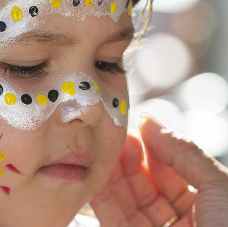 Child's face being painted